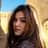 Close-up shot of a multiracial female with long hair in Morocco