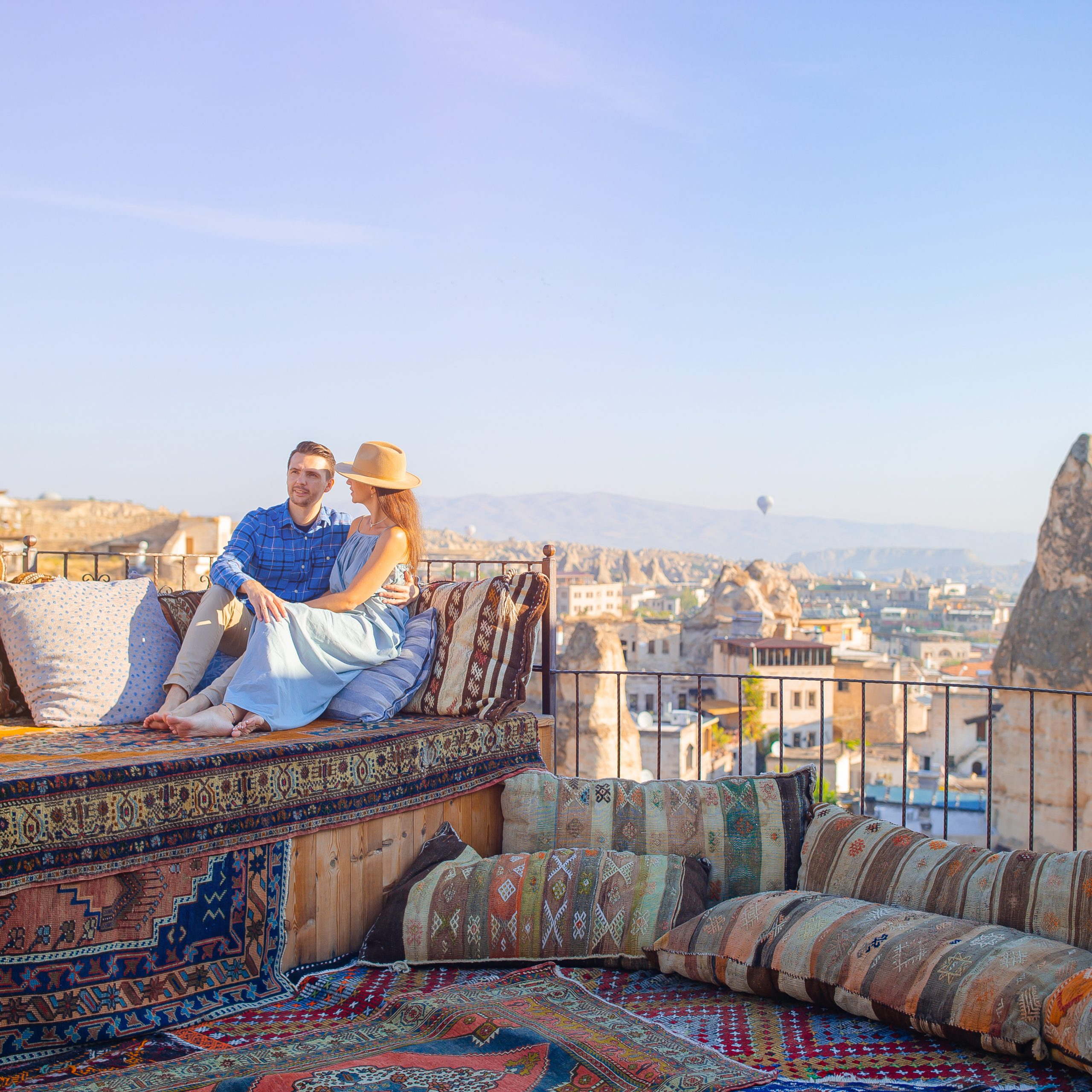 Happy couple in Cappadocia. Couple travels the world. Hot air balloon flights.