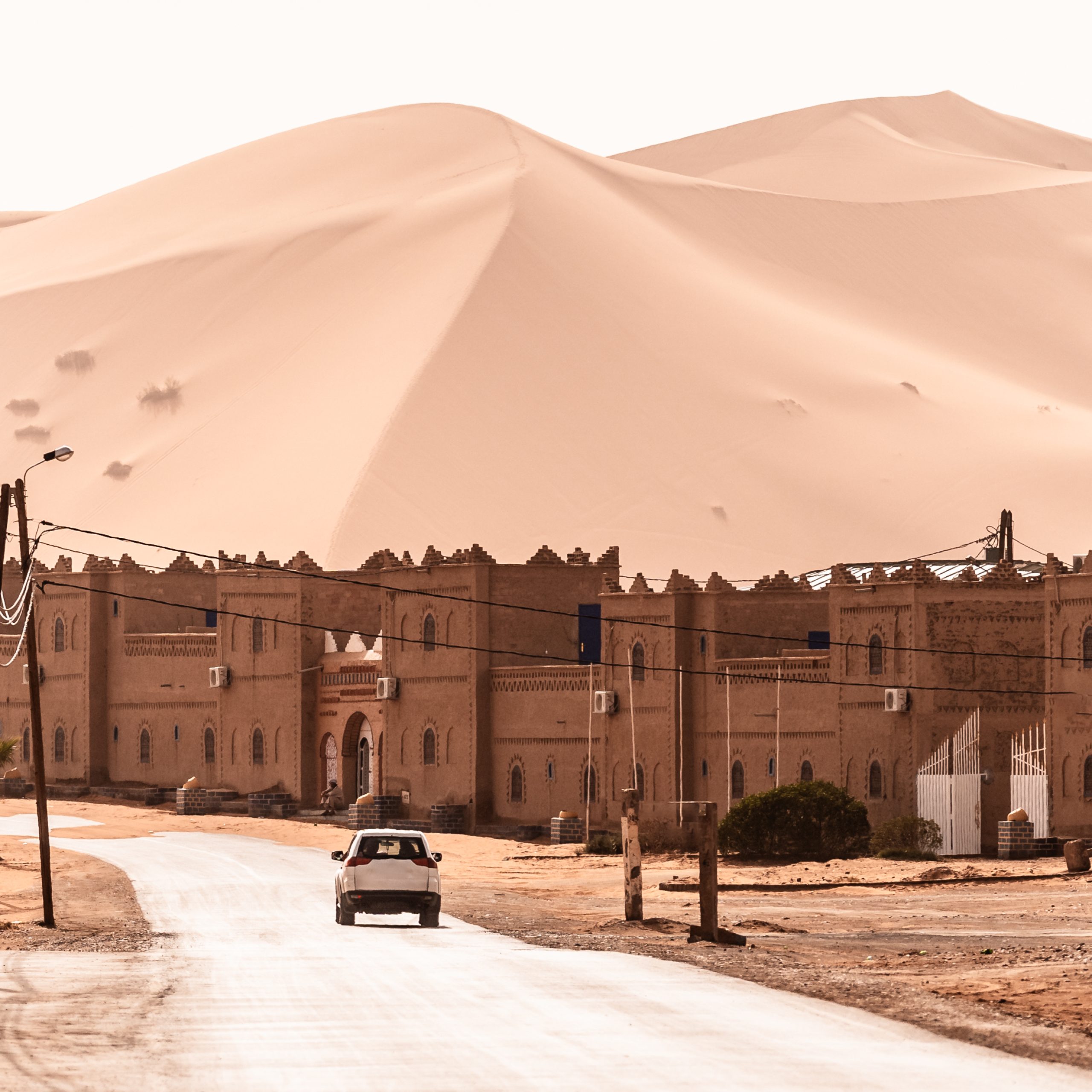 View of Merzouga and sand dunes, gateway to Sahara Desert, Merzouga, Morocco .