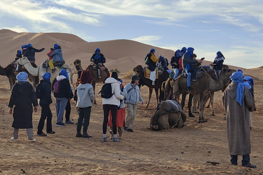 dunes merzouga desert with riding a camel
