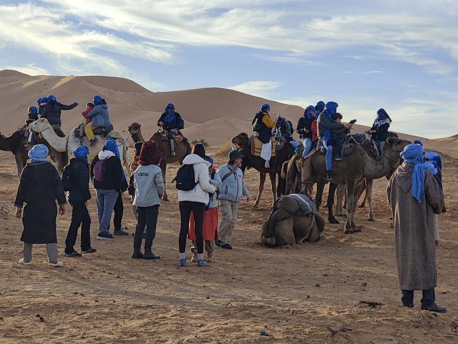 dunes merzouga desert with riding a camel